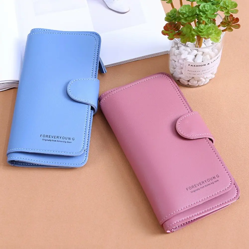 forever-young-womens-long-wallet-blue-pink Forever Young womens long wallet in blue and soft pink variants